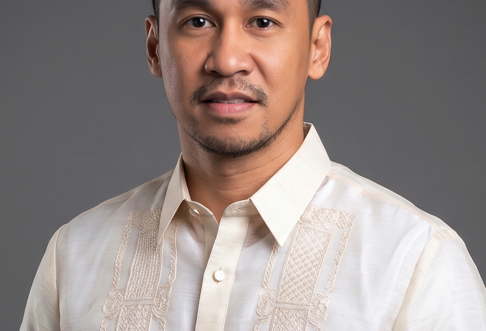 AUGUIS, John Kenneth O.